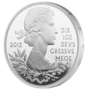 Королева Елизавета II в дни коронации в 1953 году выглядела как на этой монете