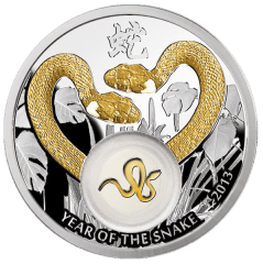 Реверс серебряной монеты "Золотые змейки"
